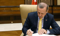 Erdoğan'dan iki yasaya onay