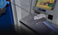 ATM dolandırıcıları suç üstü yakalandı!