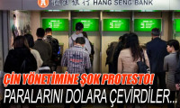 Çin'i protesto eden eylemciler ATM ve bankalardan paralarını çekiyor