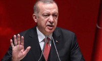 Erdoğan: Elimiz kolumuz bağlı kalacak değildi