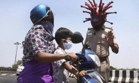 Hindistan polisinden ilginç Kovid-19 gösterisi