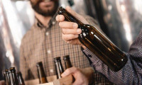 Alman bira üreticileri boş şişelerin iadesi için yalvarıyor