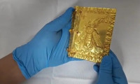 Erzincan'da 24 ayar saf altın kitap ele geçirildi