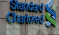 Standard Chartered'ın karı 4'te 1 eridi