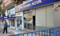 Bank Asya ortağı polise dava