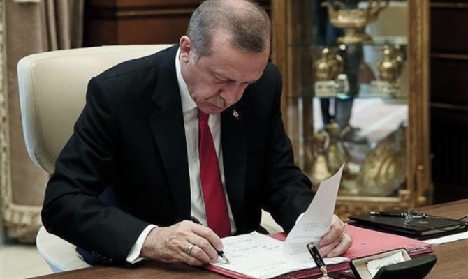 Erdoğan, uyum yasasını onayladı