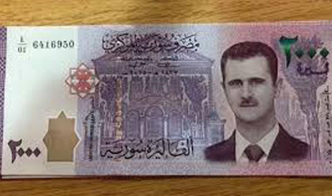 Esed rejimi Suriye lirasını devalüe etti