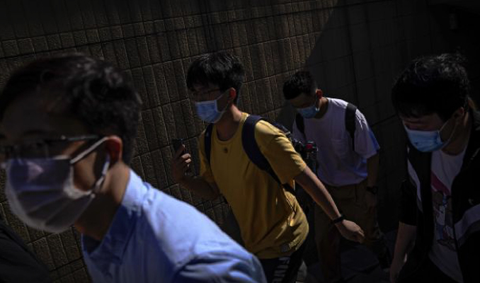 Çinli yetkililer: Yurt içi kaynaklı korona virüs salgını sona yaklaşıyor