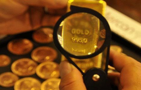 Goldman altın fiyat tahminlerini düşürdü