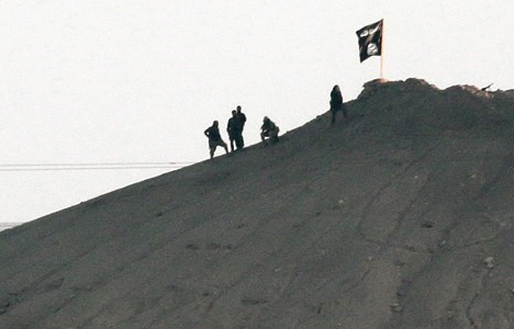 IŞİD Kobani'de terör estiriyor